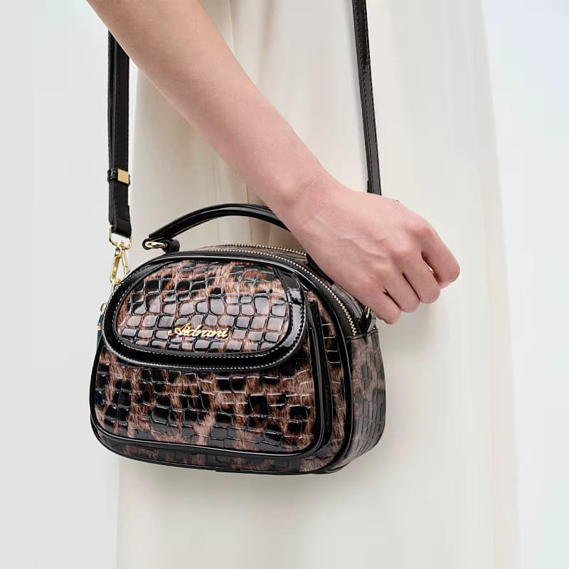 Kleine runde Tasche aus echtem Leder mit Leopardenmuster für Damen – neuer Stil, großes Fassungsvermögen, Umhängetasche, handgehalten und mit einer Schulter
