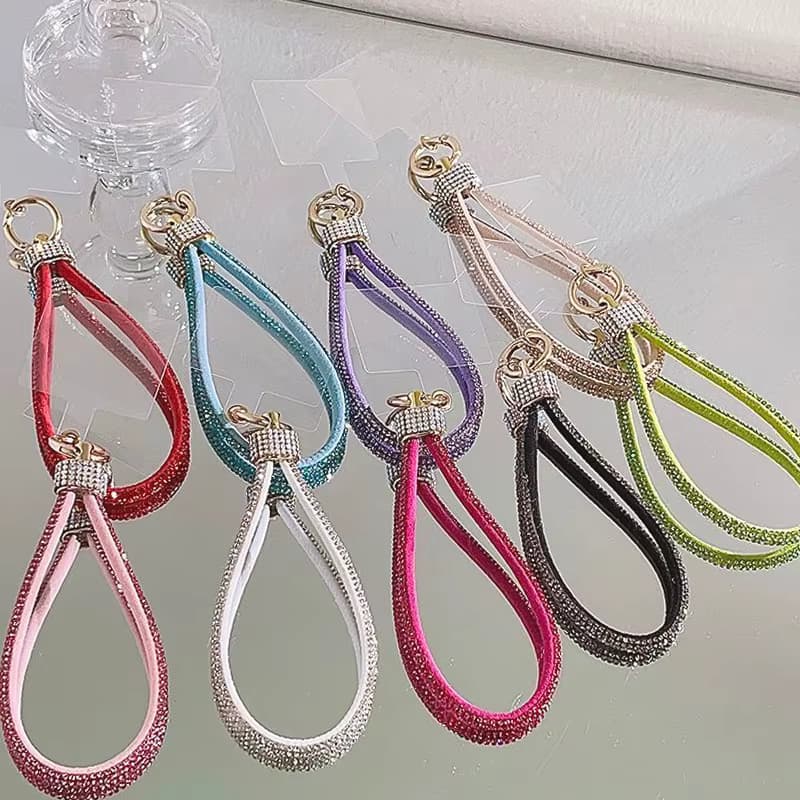 Handy-Handgelenkschlaufe Luxuriöses Strass-Schlüsselband Armband Verstärkter Handy-Anhänger für iPhone Pro Samsung Xiaomi