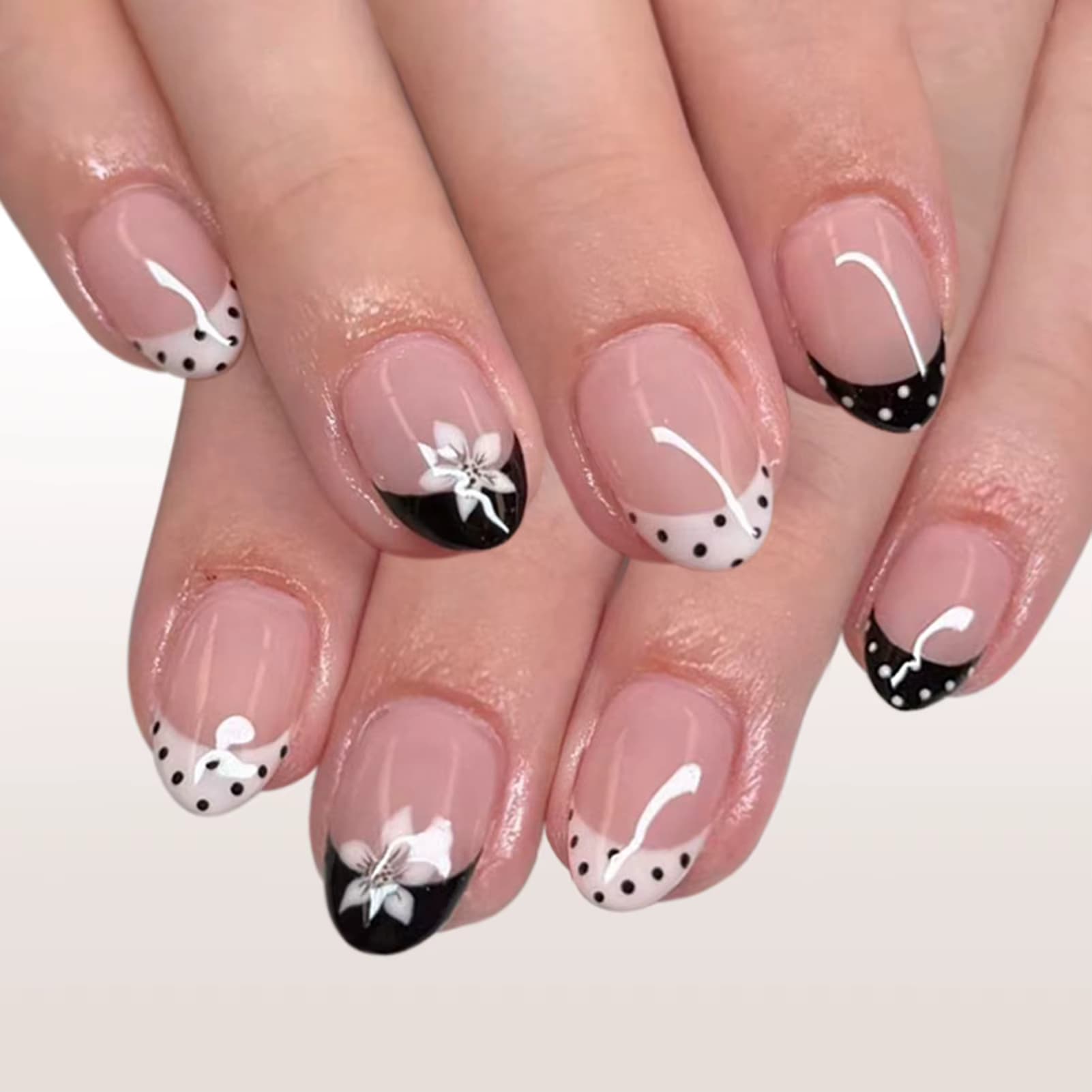 Schwarz/weiße French-Tip-Kunstnägel, 24 Stück, kurze, ovale Press-On-Nägel mit Blumen-/Polka-Dot-Print, Nude-Farbe, zum Aufkleben, Nagelkunst